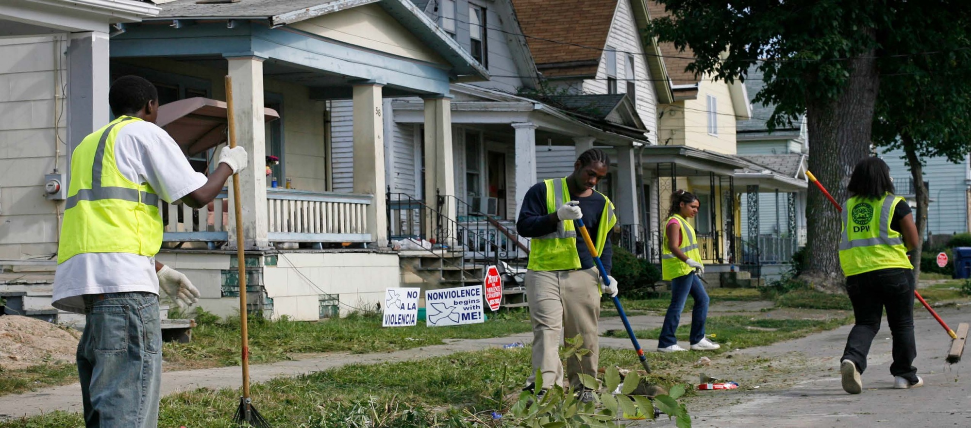 workers cleaning up a neighborhood